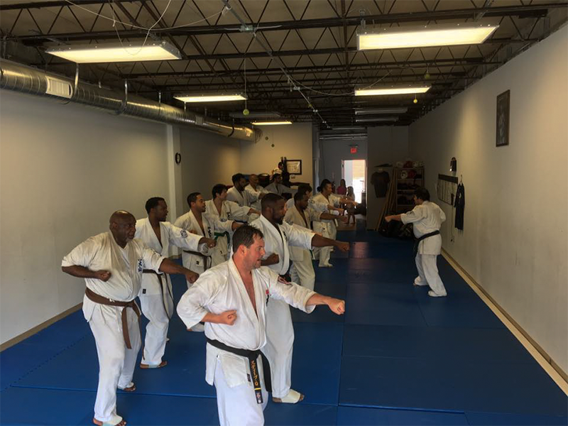 Students at World Oyama Karate Atlanta practice middle punch, or chudon tsuki